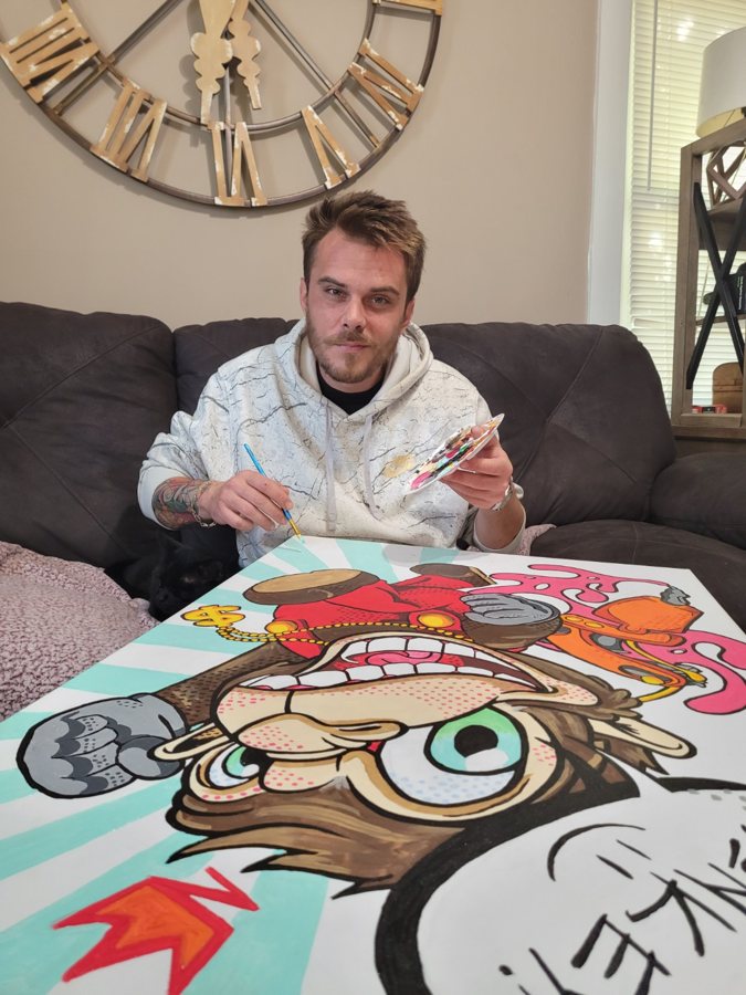 Beau Pendergraft at the easel, painting
